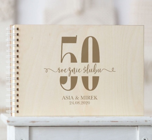 Okładka kroniki 50 rocznic z ozdobnym napisem