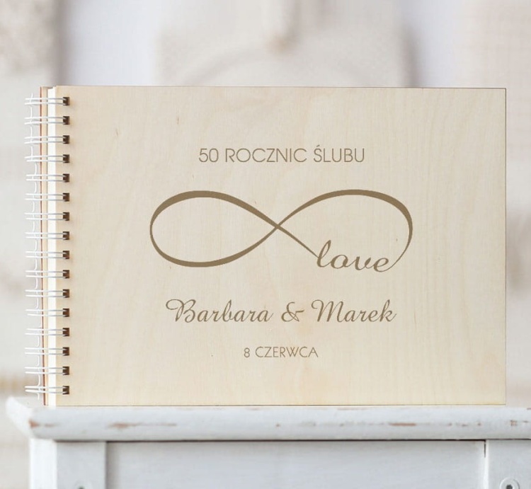 Okładka kroniki 50 rocznic z symbolem nieskończoności i napisem love