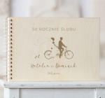 Okładka kroniki 50 rocznic z rowerem