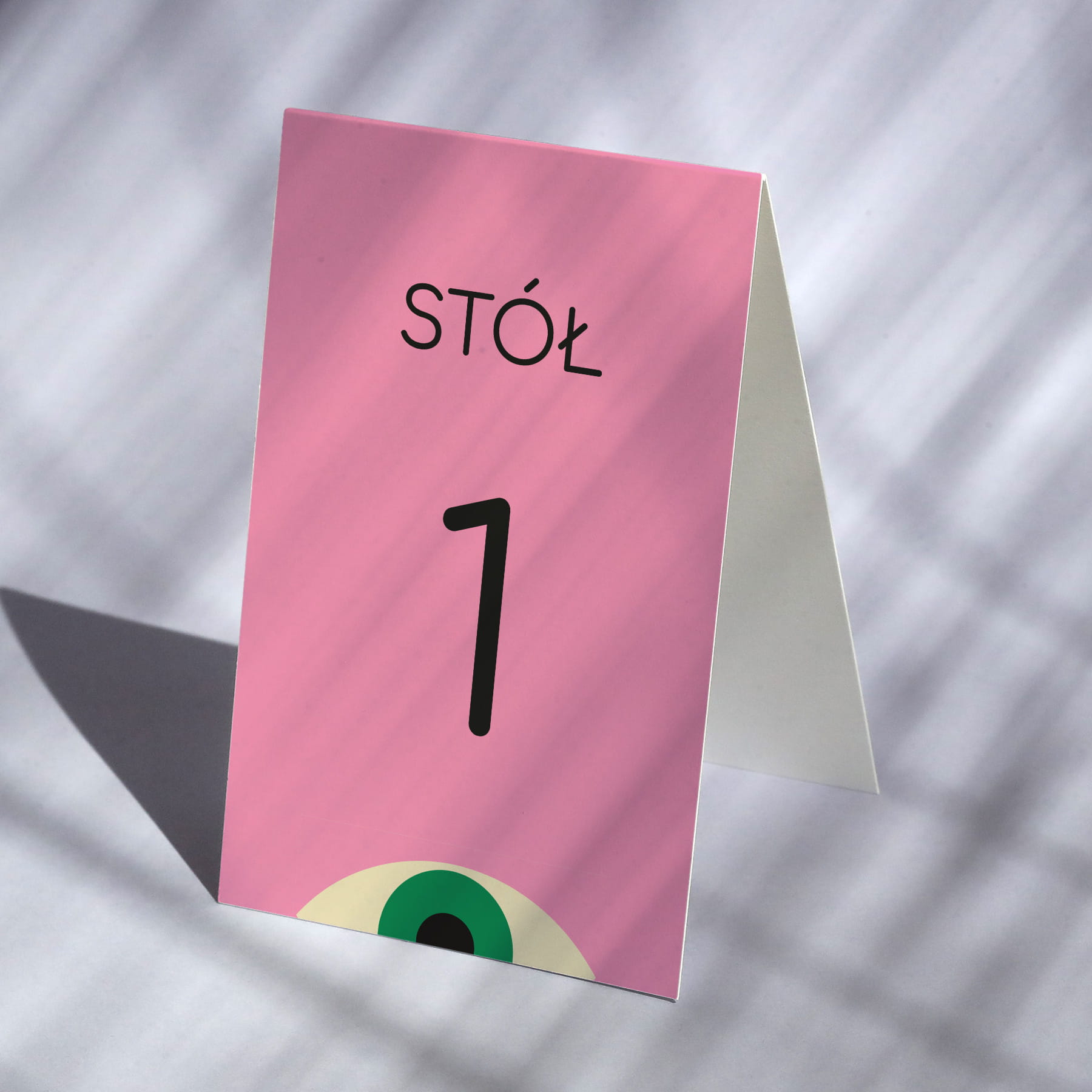 Numerki na stół urodzinowy z zielonym okiem