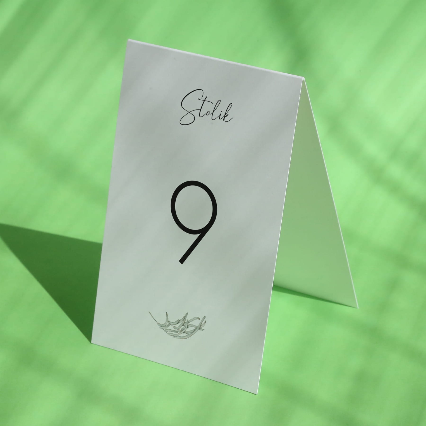 Numerki na stół urodzinowy z roślinnym motywem